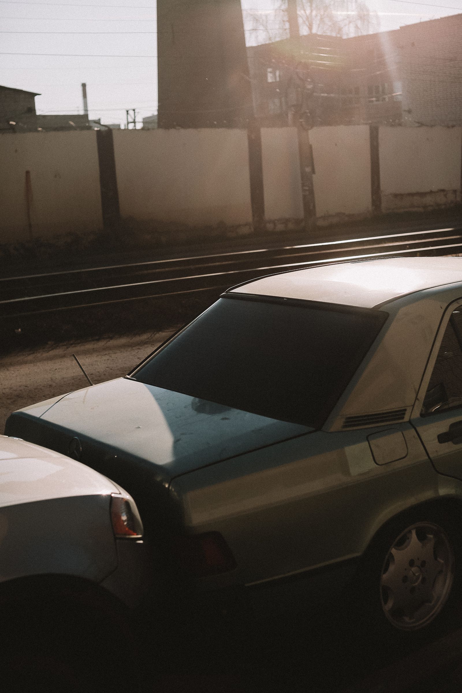 Two cars following a rear-end collision